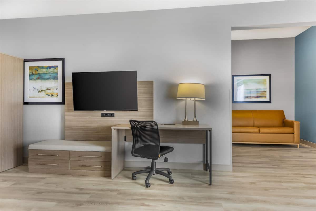 Suite, 1 King Bed, Accessible, Jetted Tub (with Sofabed) | Pillowtop beds, desk, laptop workspace, iron/ironing board