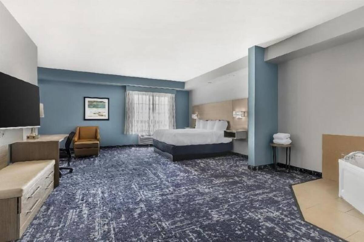 Camas con pillow-top, escritorio y espacio para trabajar con laptop