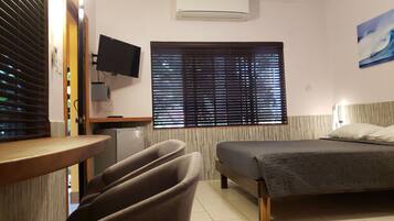 Deluxe Quadruple Room | In-room safe, individually decorated, individually furnished