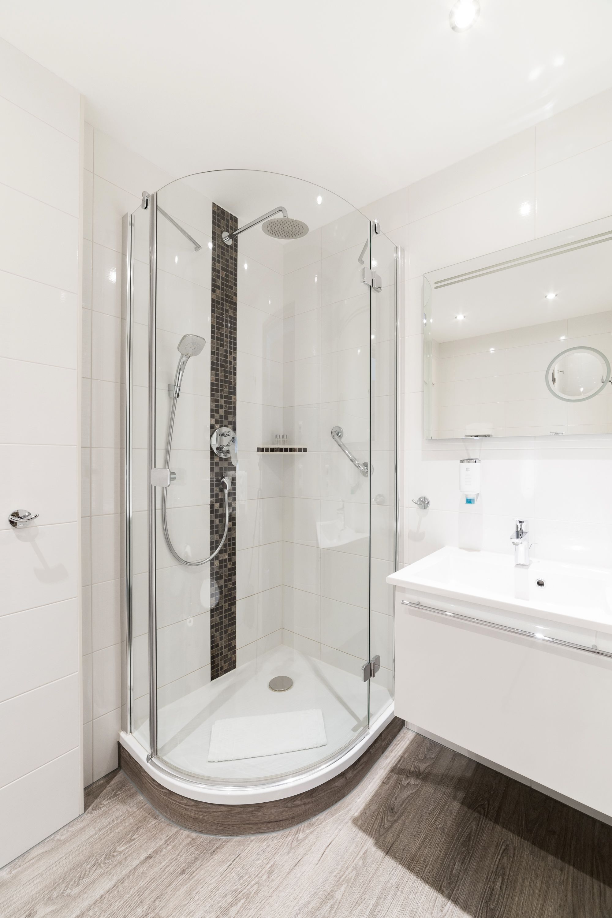 shower, hair dryer, heated floors, towels