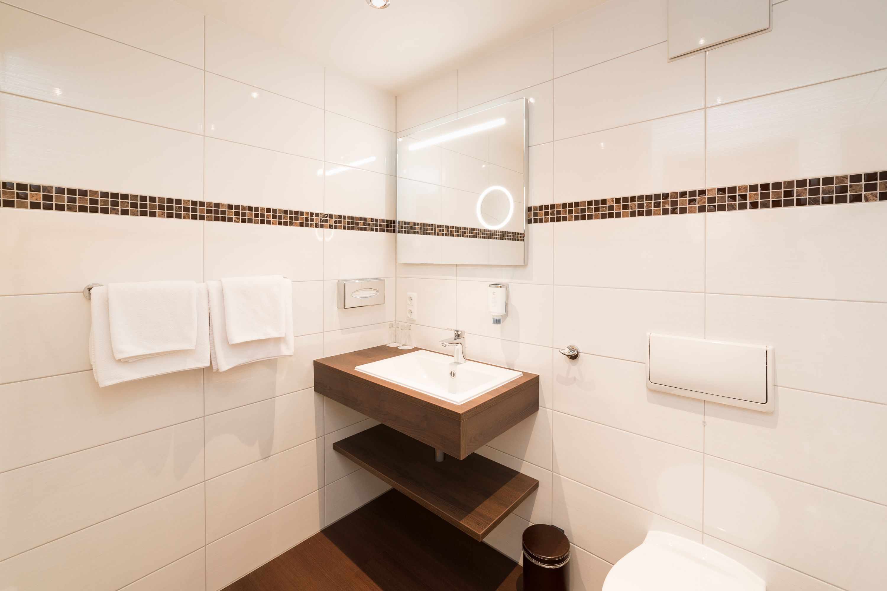 shower, hair dryer, heated floors, towels