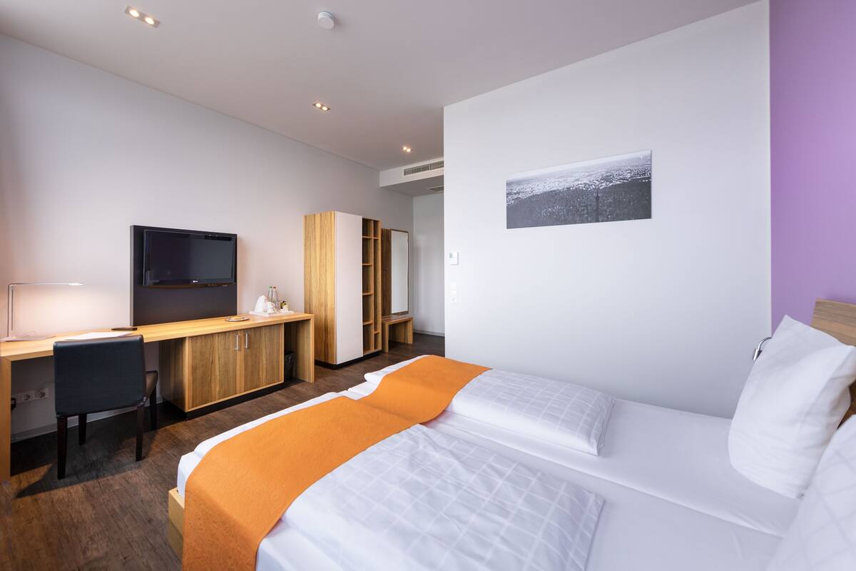 Hypo-allergenic bedding, in-room safe, desk, soundproofing
