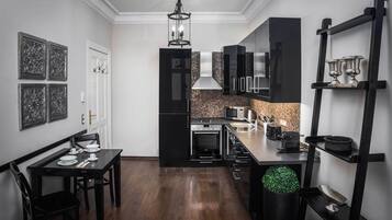 Studio Suite, 1 Bedroom (Type B) | Private kitchen | Full-size fridge, microwave, oven, stovetop