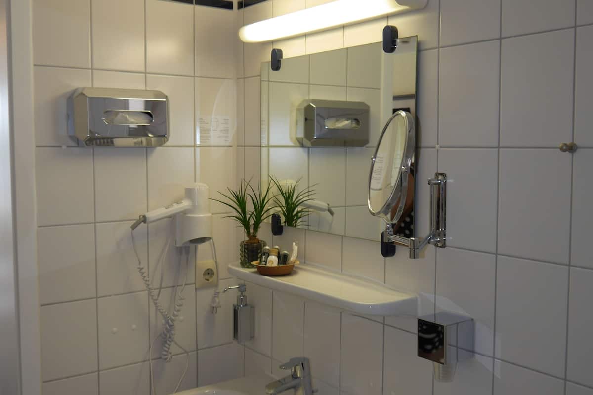 deep-soaking bathtub, free toiletries, hair dryer, towels