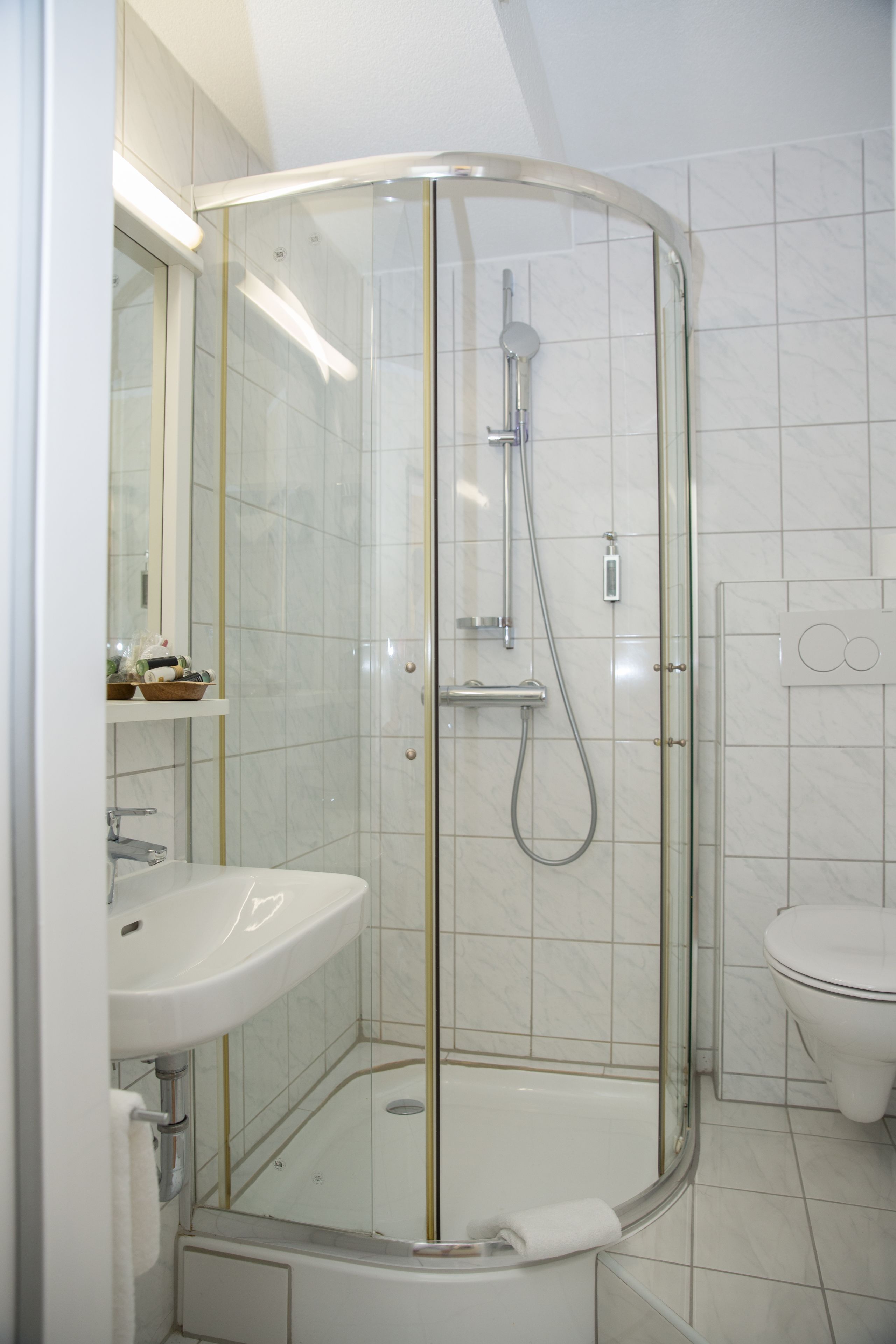 deep-soaking bathtub, free toiletries, hair dryer, towels