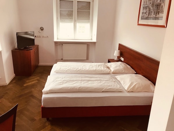 Desk, blackout curtains, free cots/infant beds, free rollaway beds