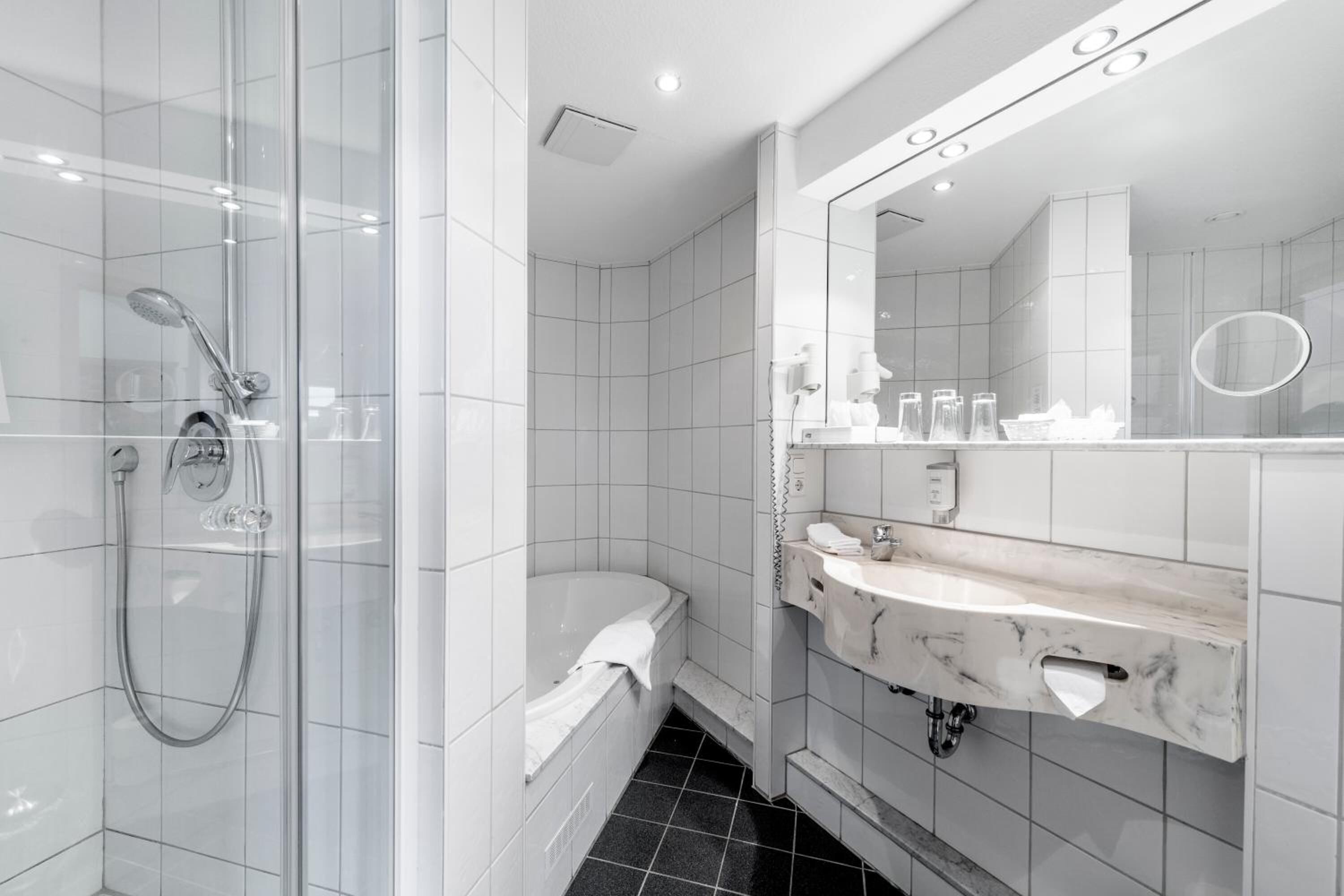 comfort room | bathroom | free toiletries, hair dryer, bathrobes, slippers