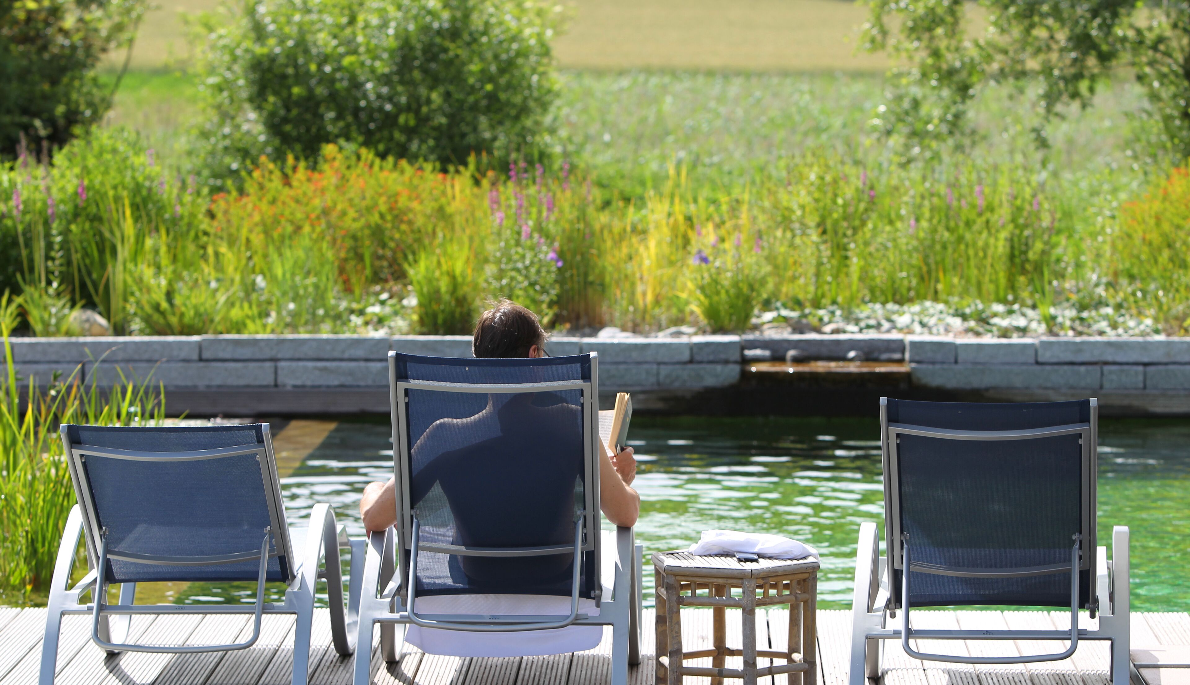 outdoor pool, pool umbrellas, pool loungers