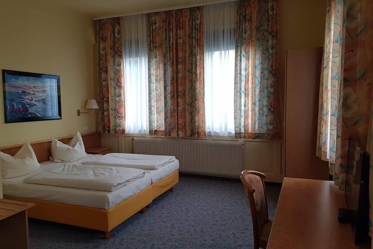 Desk, free WiFi, bed sheets
