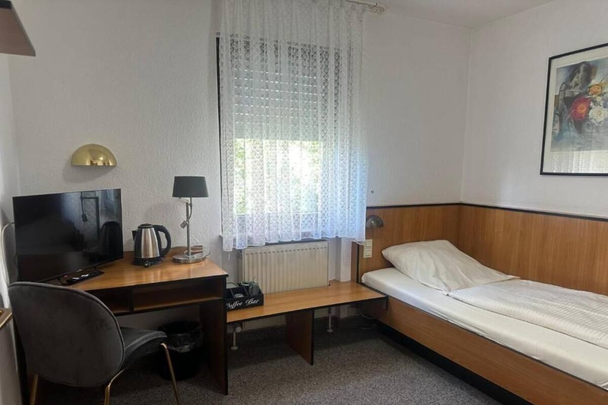 Kamar Single Comfort | Meja kerja, Wi-Fi gratis, dan seprai linen