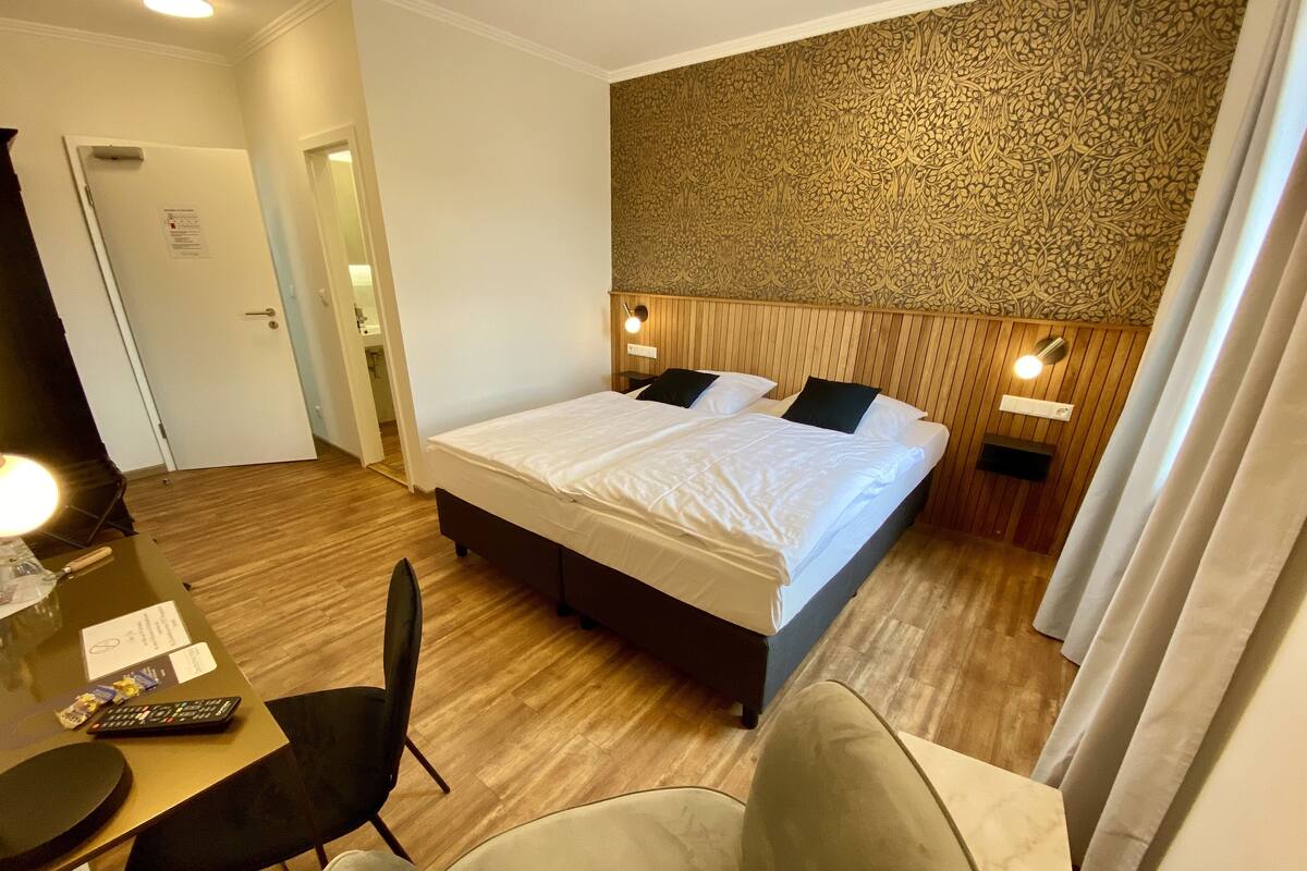 Hypo-allergenic bedding available, desk, laptop workspace, WiFi (free)