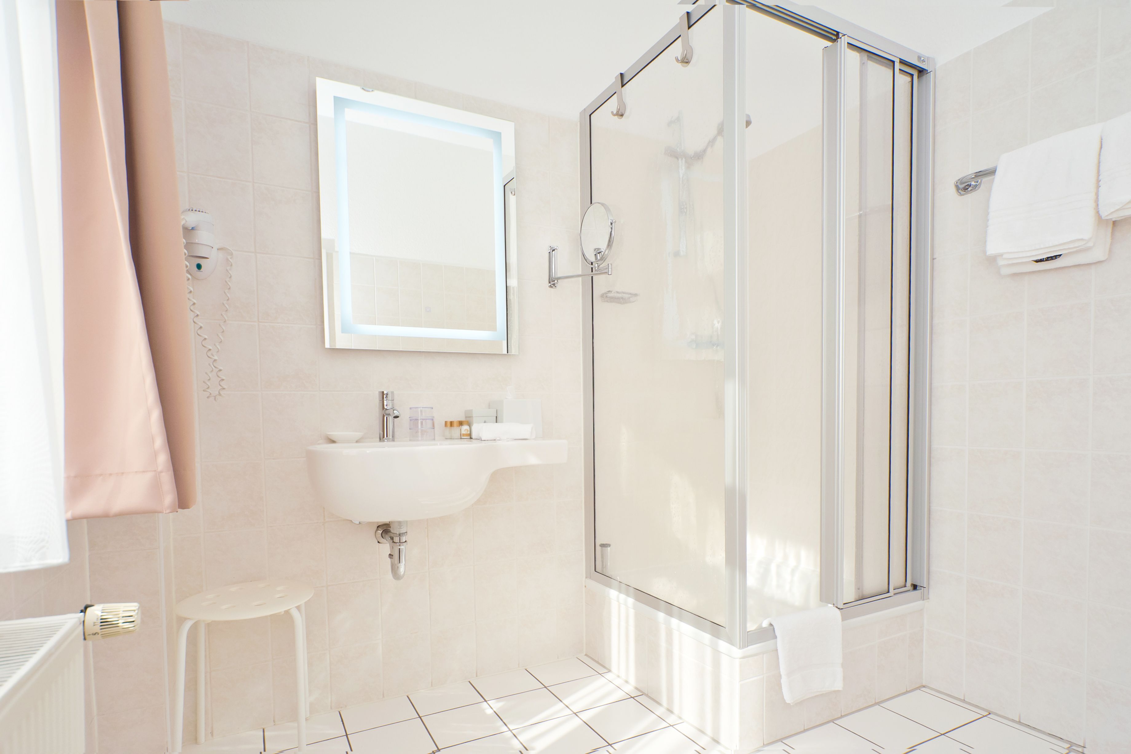 shower, free toiletries, hair dryer, towels