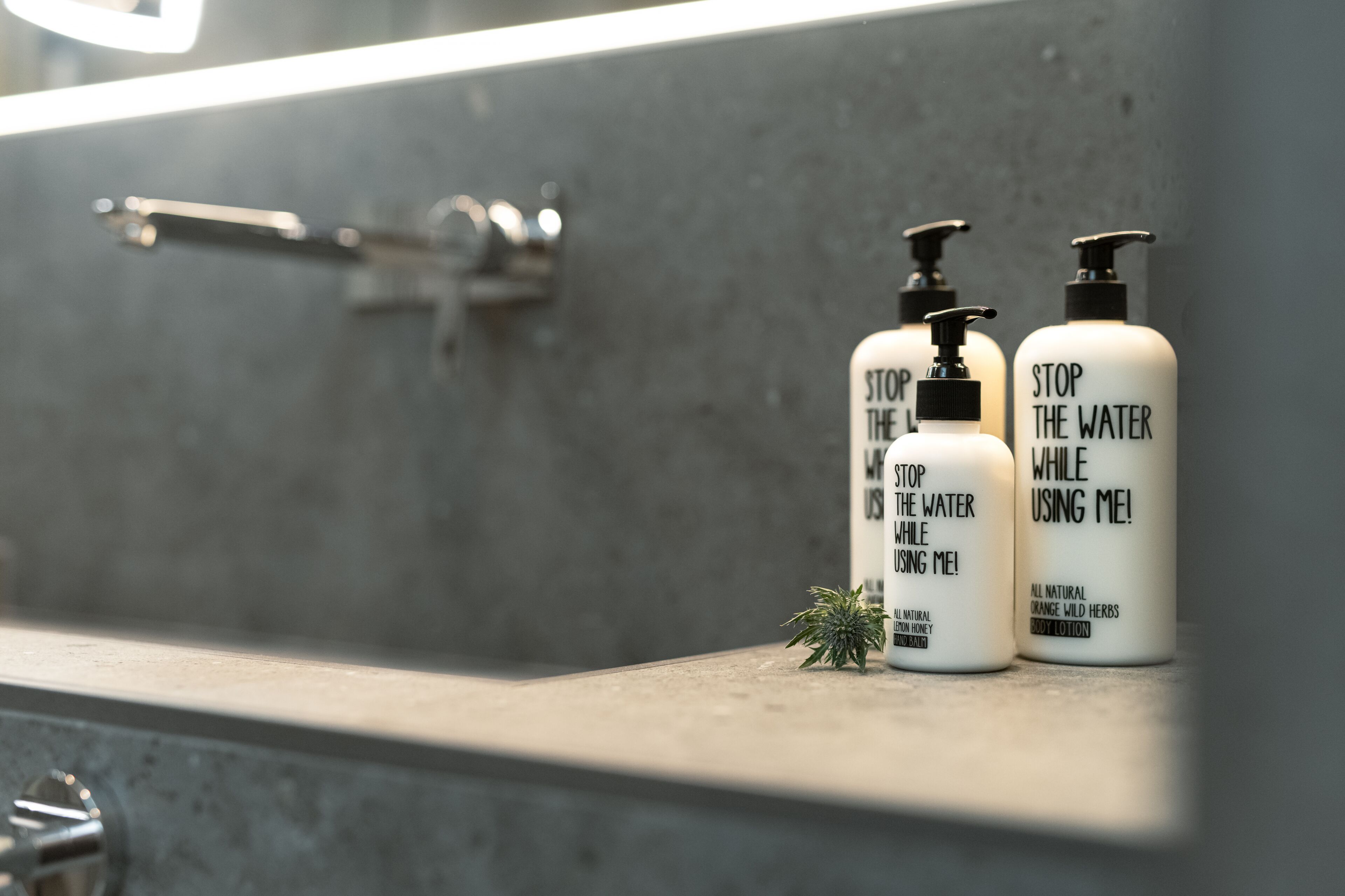 design double room | bathroom | rainfall showerhead, eco-friendly toiletries, hair dryer, bathrobes