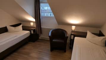 Economy Twin Room, 2 Twin Beds | In-room safe, desk, free WiFi, bed sheets