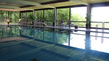 Indoor pool, open 7 AM to 11 PM, sun loungers