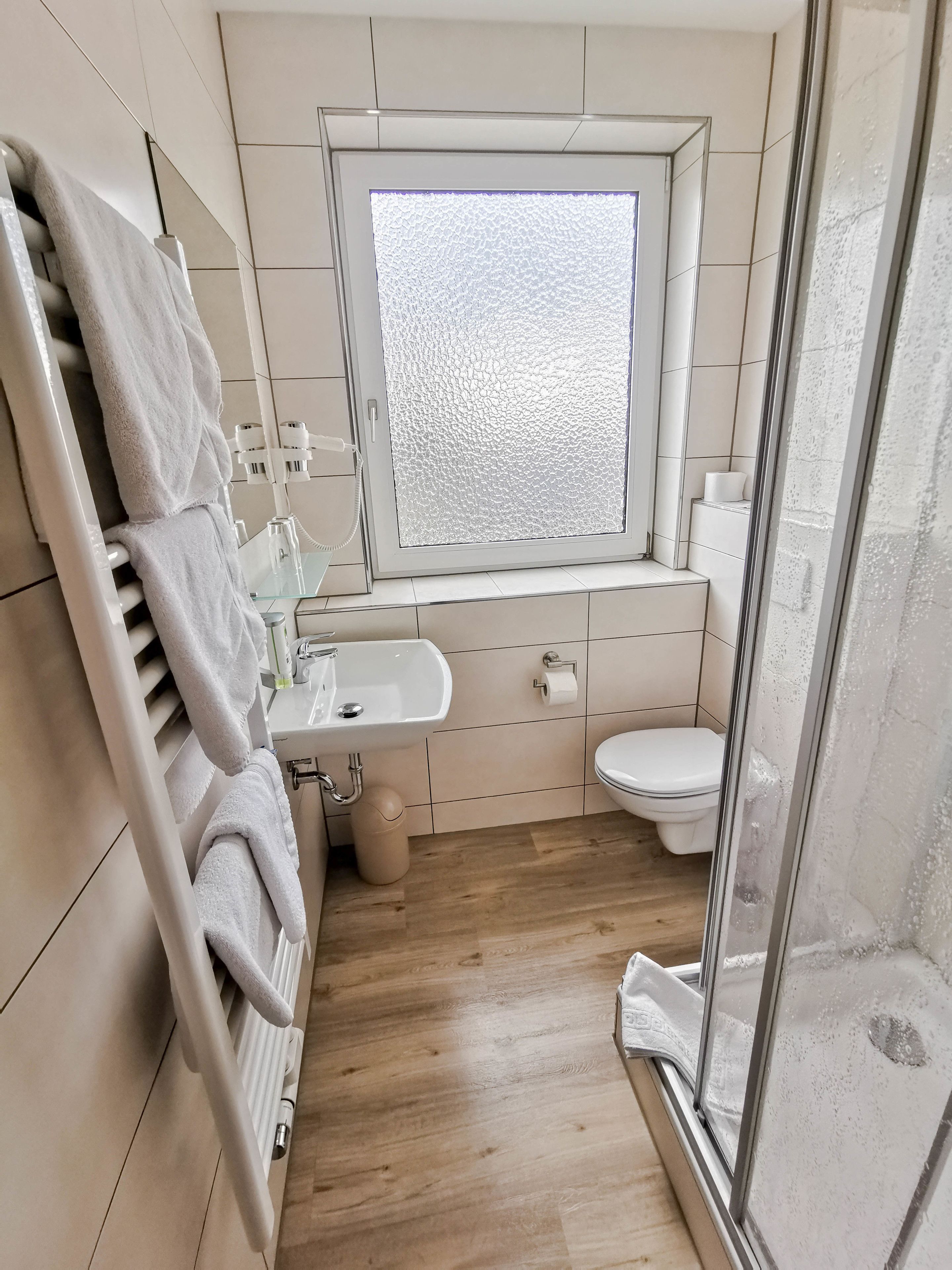 family room | bathroom | shower, hair dryer, towels