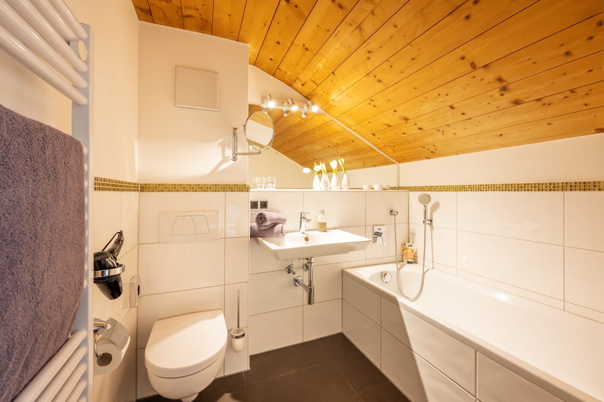 comfort double room, 1 king bed with sofa bed | bathroom | shower, hair dryer, bathrobes, towels