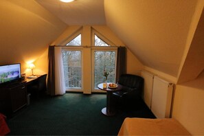 Comfort eenpersoonskamer | Woonruimte | Flatscreentelevisie