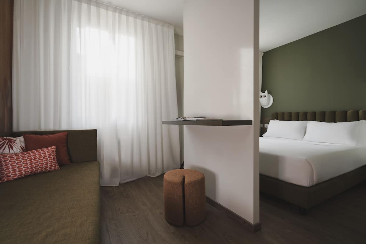 Junior Room | 1 bedroom, premium bedding, minibar, in-room safe