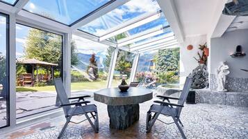 Indoor pool, pool umbrellas, sun loungers