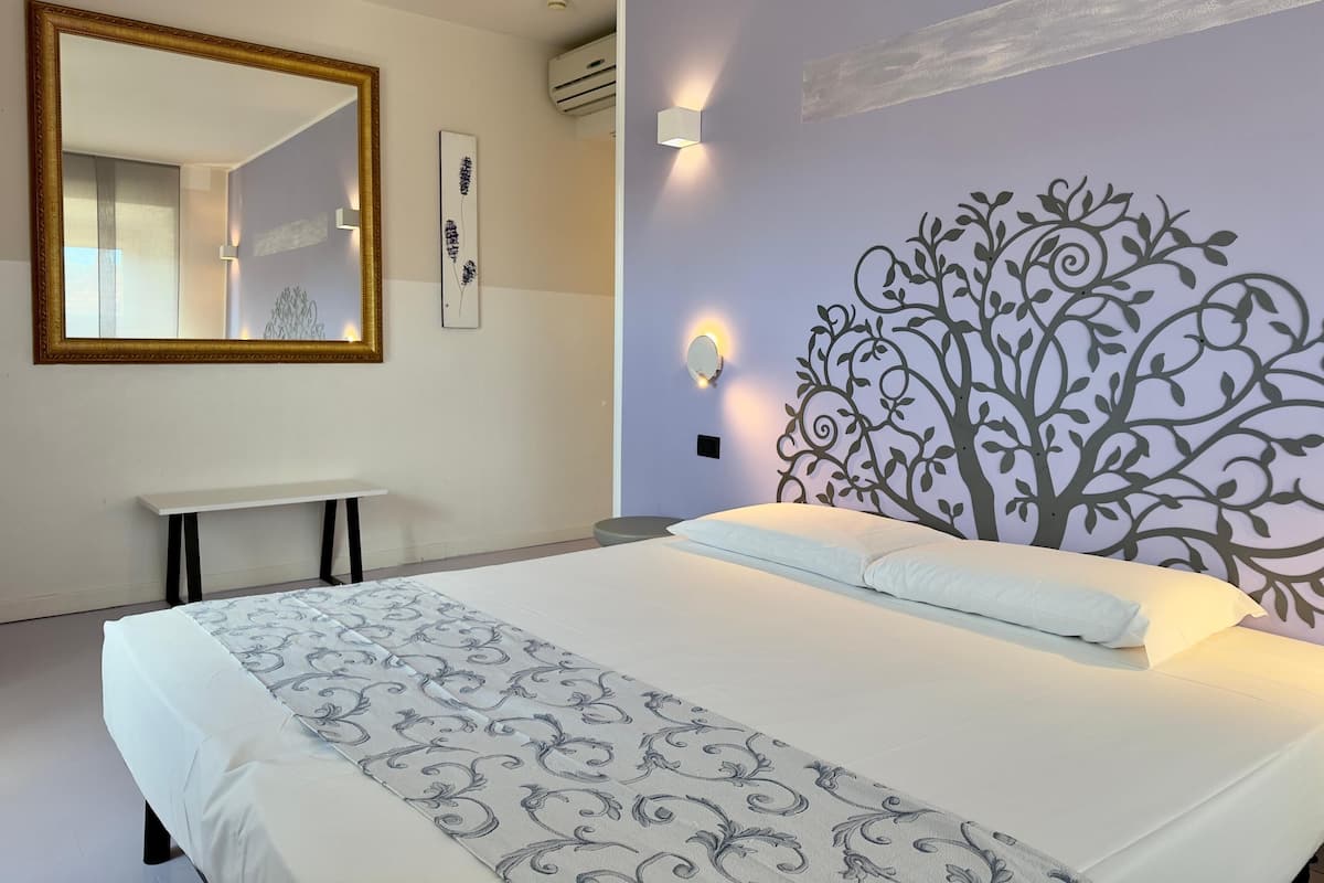 Standard Double or Twin Room | Minibar, in-room safe, desk, blackout drapes