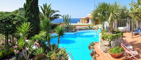 Indoor pool, outdoor pool, open 9:30 AM to 7:30 PM, pool umbrellas