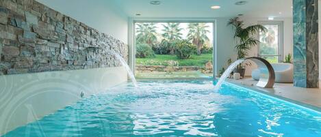 Indoor pool, seasonal outdoor pool, pool umbrellas, pool loungers