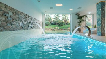 Indoor pool, seasonal outdoor pool, pool umbrellas, sun loungers