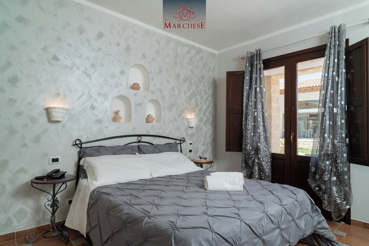 Classic Double Room, Ground Floor | Minibar, in-room safe, individually furnished, desk