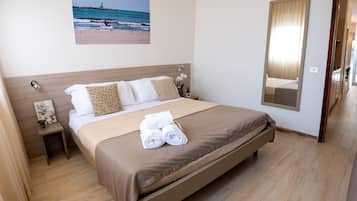 Leilighet, 2 soverom | Sengetøy av topp kvalitet, safe på rommet og barnesenger (inkludert)