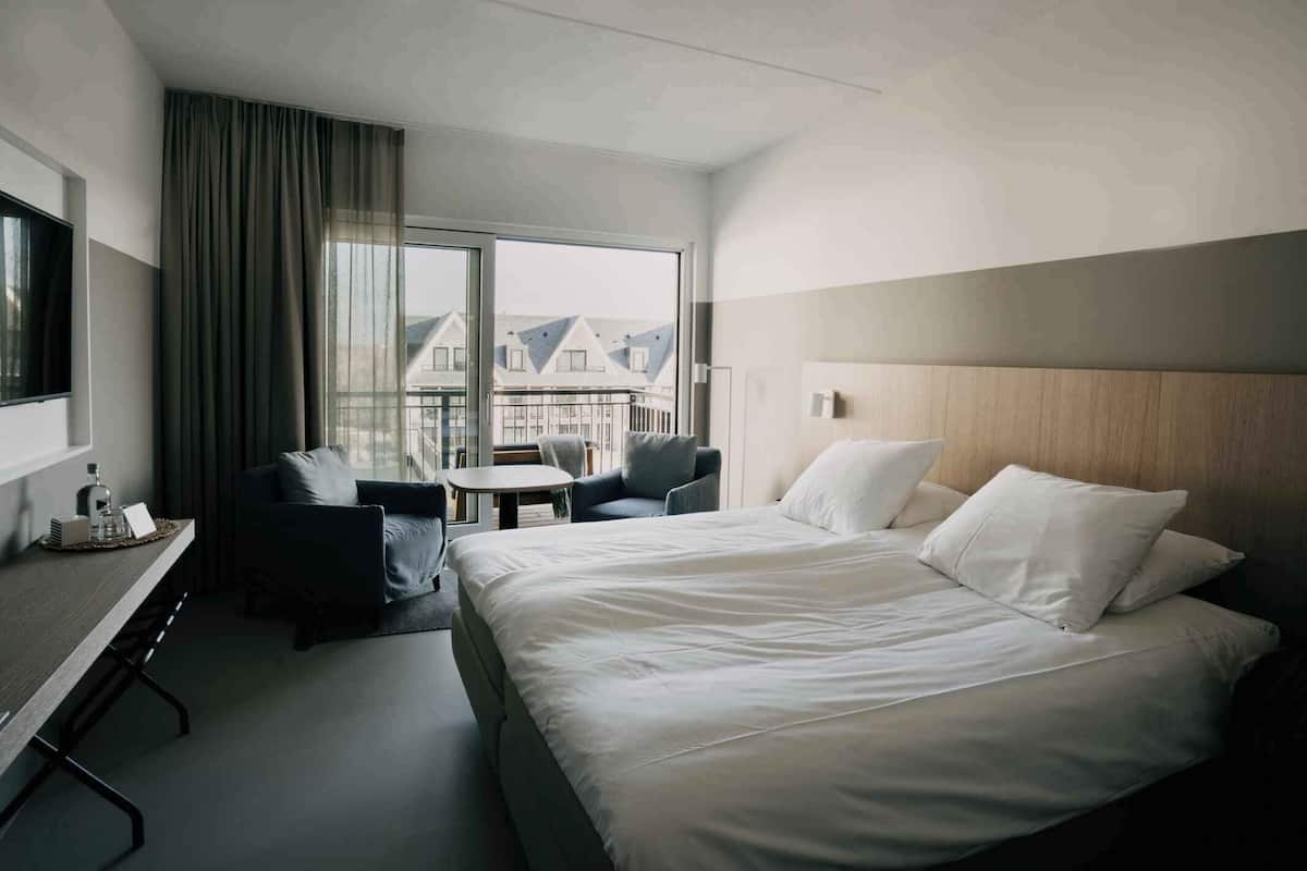 Standaard kamer | Een kluis op de kamer, gratis wifi, beddengoed