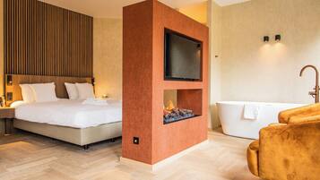 Junior suite | Een minibar, een kluis op de kamer, verduisterende gordijnen