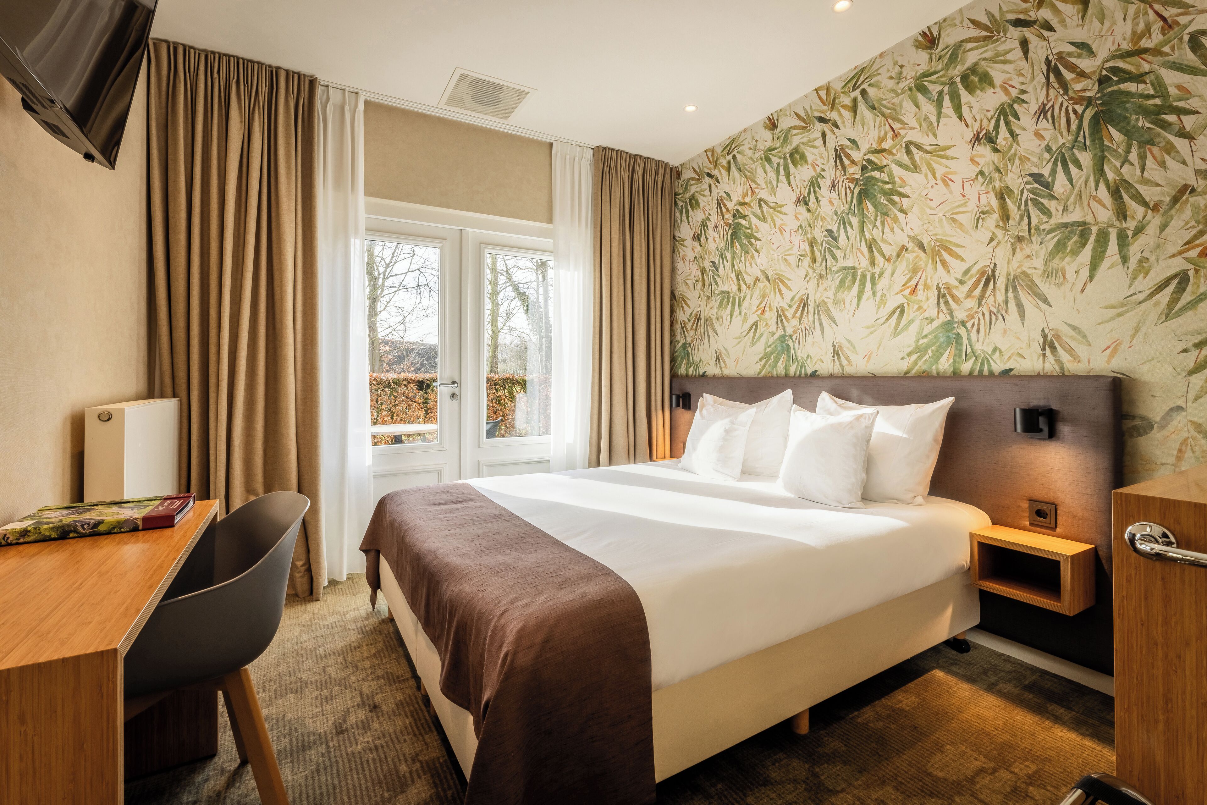 Een minibar, een kluis op de kamer, verduisterende gordijnen, babybedden