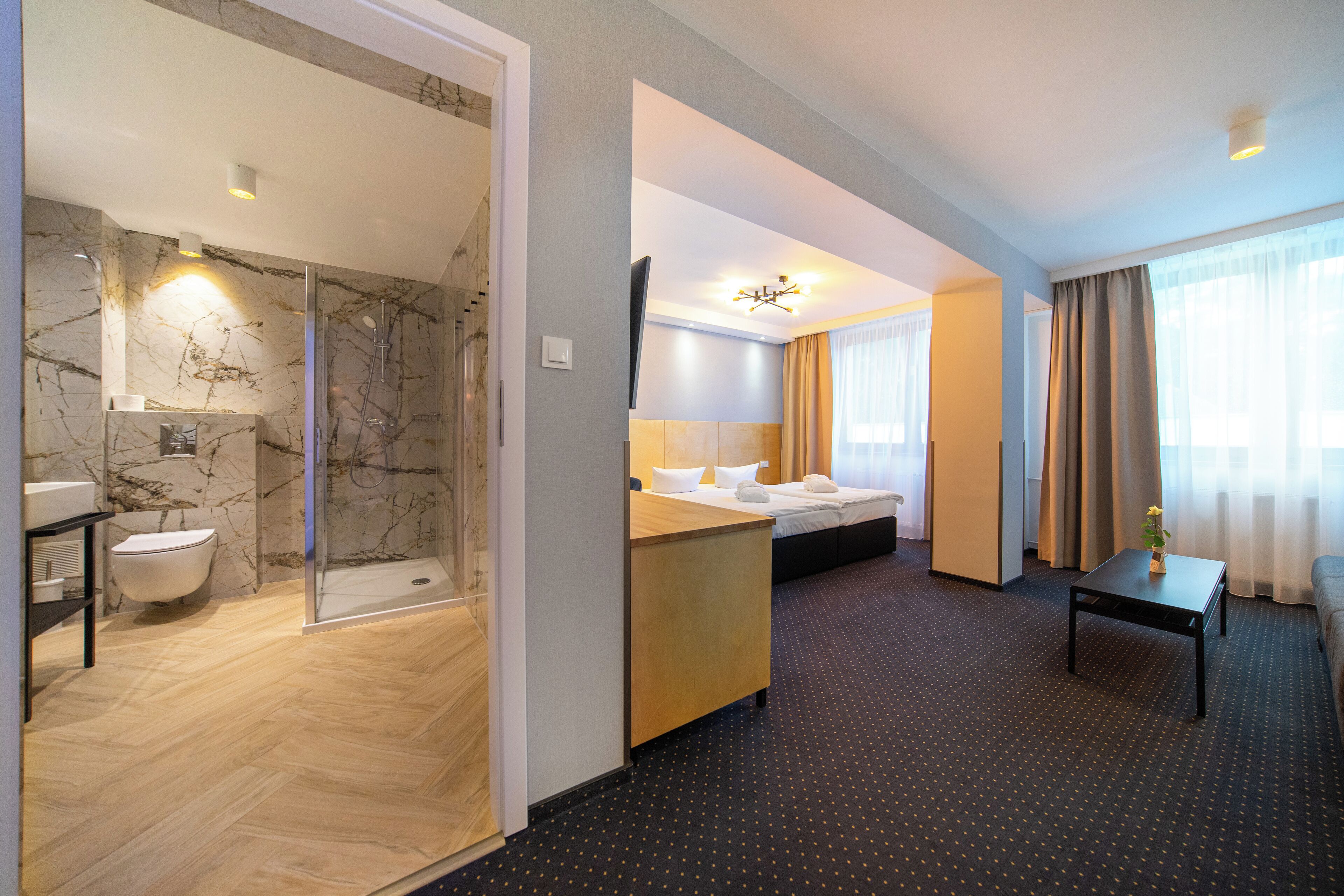comfort suite | bathroom | shower, free toiletries, hair dryer, bathrobes