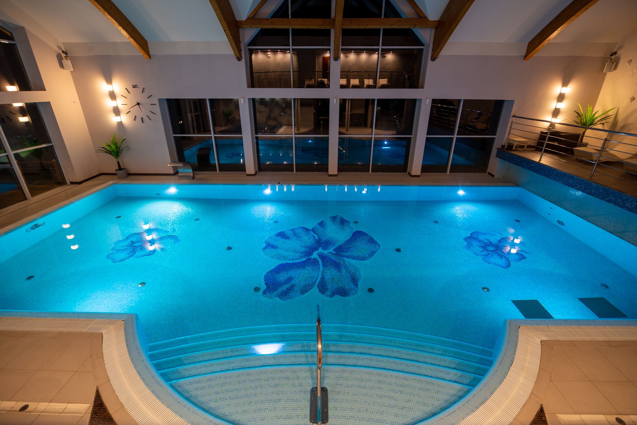 indoor pool, open 9:00 am to 9:00 pm, pool loungers, lifeguards on site