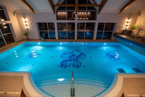 Indoor pool, open 9:00 AM to 9:00 PM, sun loungers, lifeguards on site