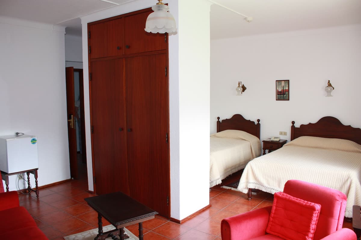 Desk, soundproofing, iron/ironing board, rollaway beds
