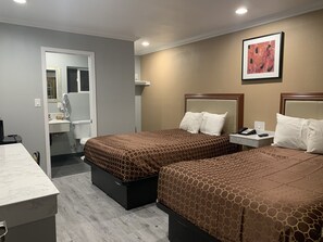 Chambre Double | Fer et planche à repasser, Wi-Fi gratuit, draps fournis