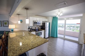 Apartment, 2 Bedrooms | Living area | 42-inch TV with cable channels, DVD player