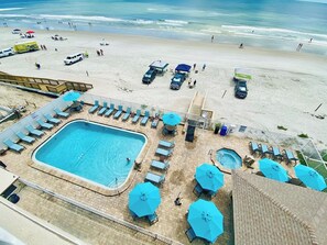 Outdoor pool, a heated pool, sun loungers
