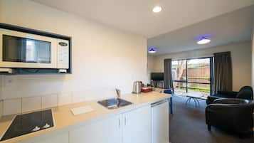 Two Bedroom Unit | Private kitchen | Fridge, microwave, stovetop, coffee/tea maker