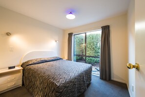 Two Bedroom Unit | Living room | 32-inch LCD TV with satellite channels, TV - Annabelle Court Motel (Christchurch)