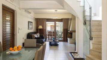 Three Bedroom Villa - Split Level | Living area | 42-inch LED TV with satellite channels, TV