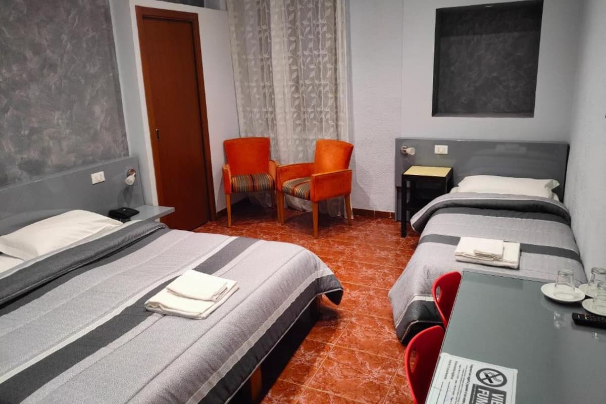 Desk, free WiFi, bed sheets