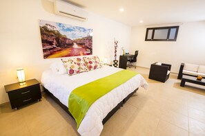 Junior Suite | Premium bedding, minibar, in-room safe, individually decorated