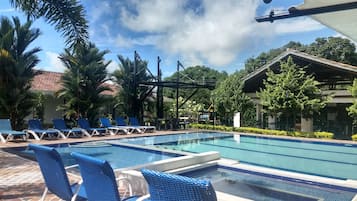 Outdoor pool, pool umbrellas, sun loungers