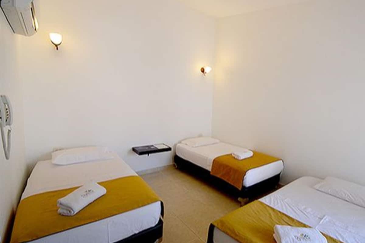 Family Room | Premium bedding, minibar, in-room safe, individually decorated