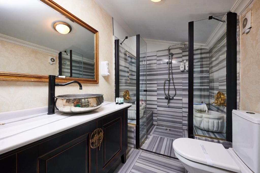 luxury penthouse, 2 bedrooms, balcony, city view | bathroom | shower, hydromassage showerhead, designer toiletries, hair dryer