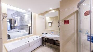 Combined shower/tub, free toiletries, hair dryer, bathrobes