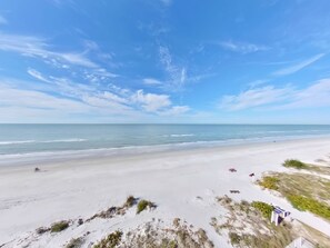 On the beach, sun loungers, beach towels
